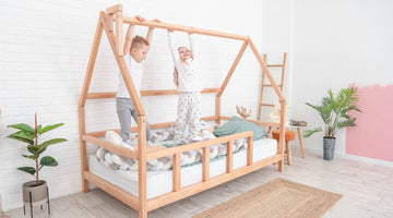 What are the benefits of a Montessori bed for child development?